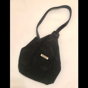 Black Guess one strap sling backpack